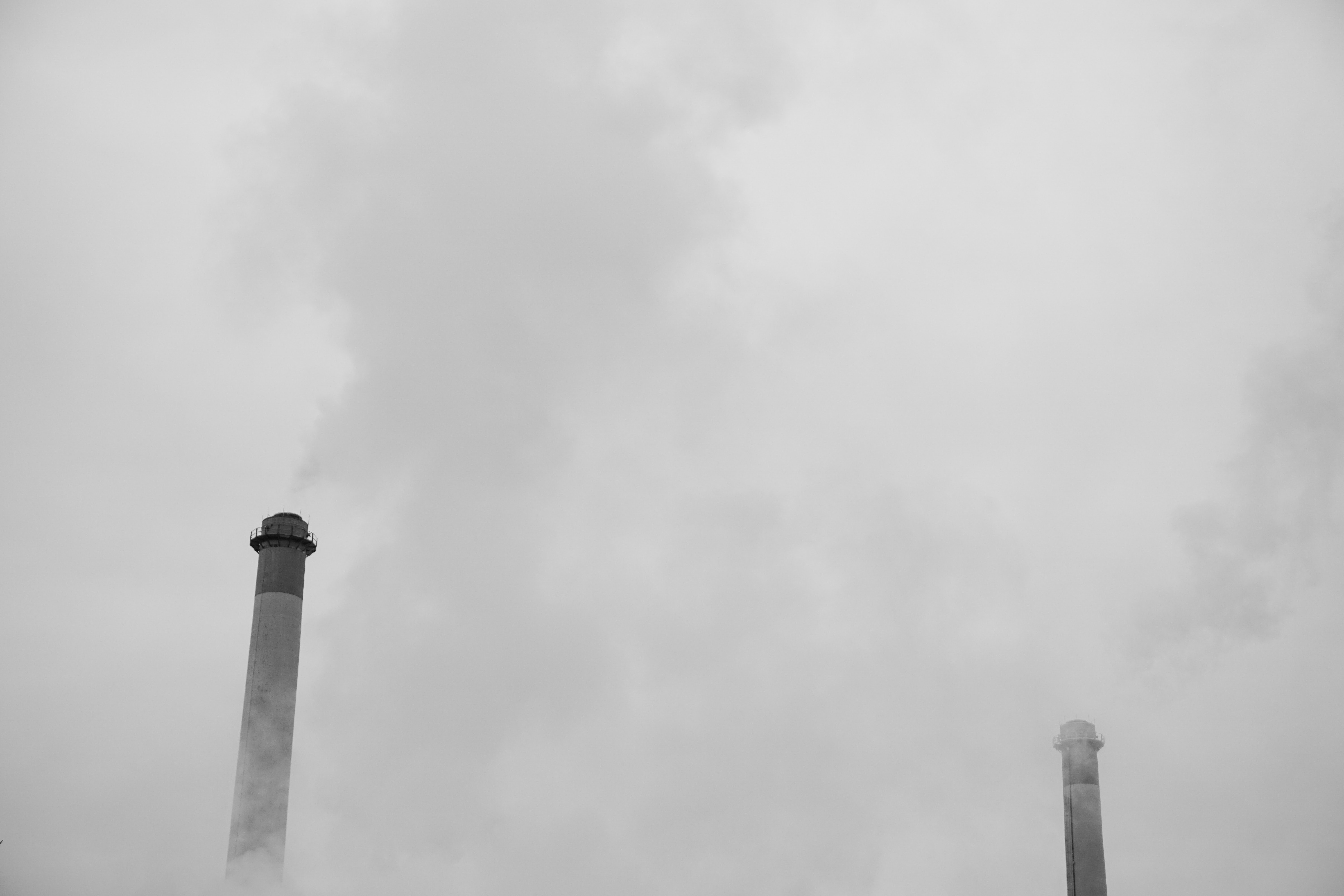 ice fog in cold weather with factory chimneys